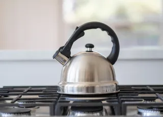 A kettle and household cooking equipment