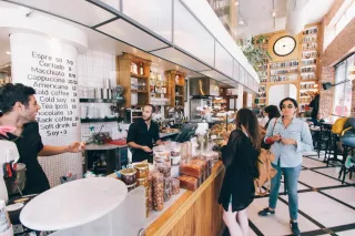 Customers and staff in a cafe