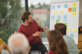 A person giving a business presentation