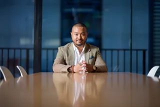 A professional seated at a meeting table